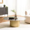 Image de Macabane - Table basse ronde 110x110cm plateau en fer noir pied strié doré OS