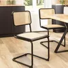 Image de MACABANE Pierre - Lot de 2 chaises Assise Bois Noir/rotin Naturel Pieds métal