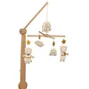 Image de Mobile musical en bois avec jouets en coton