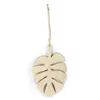 Image de Suspension en bois 'Graine Créative' Monstera 15 cm x 9.5 cm