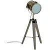 Image de Lampe projecteur design vintage et rétro en métal style cuivre et trépied en bois.
