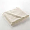 Image de Douceur d'intérieur - Plaid bouclette unie Wooly naturel - 180x220 CM 180x220 cm