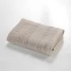 Image de Douceur d'Intérieur, Serviette de Toilette (50 x 90 cm) Tendresse Taupe, Eponge Unie 100% Coton