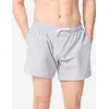 Image de Boardshort surf short de bain surf court 15" homme, 100 Texturé bleu