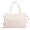 Image de Badabulle Sac à langer Pocketstyle - Plan à langer Housse isotherme Pochette Attaches-poussette inclus - Crème Rose Clair