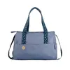 Image de Badabulle Sac à langer Pocketstyle - Plan à langer Housse isotherme Pochette Attaches-poussette inclus Bleu