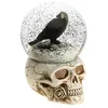 Image de Boule à neige tête de mort corbeau en résine 15,6cm