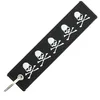 Image de CLJ - Porte-clés - 5 TETES DE MORT - BIKER - PIRATE - SKULL - Noir et blanc - Humour - Bicker