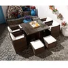 Image de CONCEPT USINE | Salon de Jardin Encastrable Résine Tressée 8 Pers | Miami | Marron Coussins Blanc | Table Plateau de Verre Amovible + 4 Fauteuils + 4 poufs | Coussins Déhoussables | Résiste à l'eau