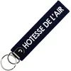 Image de CLJ - Porte-clés - Hôtesse de l'Air - Flight Attendant - Bleu Marine - Grades Aviation Civile - Élégance Française