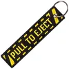 Image de CLJ - Porte-clés - PULL TO EJECT - Noir et jaune - Sécurité aviation - Urgence