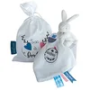 Image de Doudou et Compagnie - Sac à Doudou Lapin UNICEF - 10 Cm Blanc - Idée Cadeau de Naissance Fille et Garçon - Garantie Doudou Perdu - DC3715