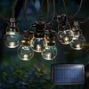 Image de SKYLANTERN® Guirlande Solaire Extérieur 10M Transparente + 3M de Câble - Guirlande Lumineuse Exterieure 10 Bulbes Transparents - Guirlande Guinguette Exterieur pour Deco Jardin Exterieur