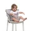 Image de BabyToLove Pocket Seat | Lightweight Travel High Chair for Babies | Folds Small, Safe Fit for Most Chairs, Machine Washable | Green Tropic