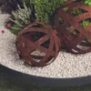Image de Jardinex Boule déco métal ajourée - Rouille 40 cm