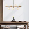 Image de CONCEPT USINE Suspension Dorée VICTOIRE 7 Lampes Globes Ronds
