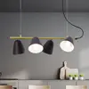 Image de Näve Suspension Triton noire et dorée, quatre lampes