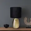 Image de Näve Lampe à poser Aurum, abat-jour tissu, noir/doré