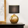 Image de FISCHER & HONSEL Lampe à poser Foro, bronze/noir, hauteur 39 cm