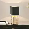Image de FISCHER & HONSEL Lampe de table Ouro, noir/bronze antique, 35 cm, textile/céramique