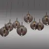 Image de Suspension LED PURE E-Infinity bronze/ambre, 198 cm, à 10 lampes