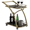 Image de IDIMEX Chariot de Service Evo Chariot à thé et Boisson desserte de Cuisine à roulettes avec poignée en métal doré, avec 2 Plateaux en Verre trempé Noir et Un Porte Bouteilles