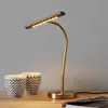 Image de Trio Lighting Lampe de table LED flexible Curtis, laiton vieilli