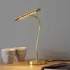 Image de Trio Lighting Lampe de table LED couleur laiton Curtis