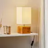 Image de Reality Leuchten Lampe à poser Woody à pied en bois, 12 cm x 12 cm