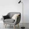 Image de Trio Lighting Lampe sur pied Marley, noir/laiton, hauteur 151 cm, métal