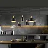 Image de Trio Lighting Suspension Chiraz, à 6 lampes, noire/dorée