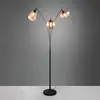Image de Trio Lighting Lampe sur pied Lumina, 3 lampes, noir/ambre, verre