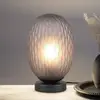 Image de Trio Lighting Lampe à poser Facette, gris fumé, hauteur 29 cm, verre, E27