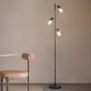 Image de Reality Leuchten Lampe sur pied Cadiz, noir/ambre, à 3 lampes, hauteur 154 cm