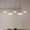 Image de Trio Lighting Suspension LED Keaton, gris clair, longueur 140 cm, CCT, à 5 lampes.