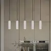 Image de Trio Lighting Suspension Soka, gris clair, longueur 85 cm, métal, à 5 lampes.