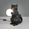 Image de Reality Leuchten Lampe à poser Gatio, noire, hauteur 30 cm, résine synthétique, G9