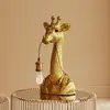 Image de KARE Animal Girafe lampe à poser, 50 cm, dorée
