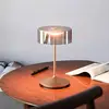 Image de Sigor Lampe de table LED rechargeable Numotion, bronze, verre, IP54, intensité