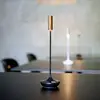 Image de Sigor Lampe de table LED rechargeable Nucandle, noir/cuivre, IP54, intensité variable