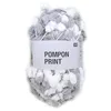 Image de Laine POMPON, Rico Design 031 Gris blanc