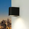 Image de Licht-Erlebnisse Applique d'extérieur murale ronde noire Aalborg avec faisceau lumineux downlight dans un style moderne IP44 GU10- idéal pour jardin