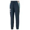 Image de PUMA Pantalon tissé Manchester City XS Marine Blue Rose Quartz Pink