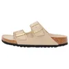 Image de Birkenstock Sandale femme Arizona triples sandcastle/oyster Birko-Flor, beige, 38 EU