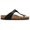 Image de BIRKENSTOCK Sandales Gizeh Foil Leo Print Medium/Narrow pour femme noir | 40