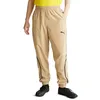 Image de PUMA Pantalon de survêtement ACM Woven Beige, Noir. S