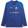 Image de PUMA Haut d’entraînement 23/24 à Fermeture zippée Olympique de Marseille L Clyde Royal Team Sun Glitter Blue Gold