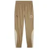 Image de PUMA Manchester Pantalon de survêtement Prématch Marron Homme 23/24 Marron XS
