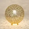 Image de Holländer Lampe à poser Lily Grande, Ø 33 cm, dorée