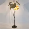Image de Holländer Lampadaire LED Controversia, abat-jour doré